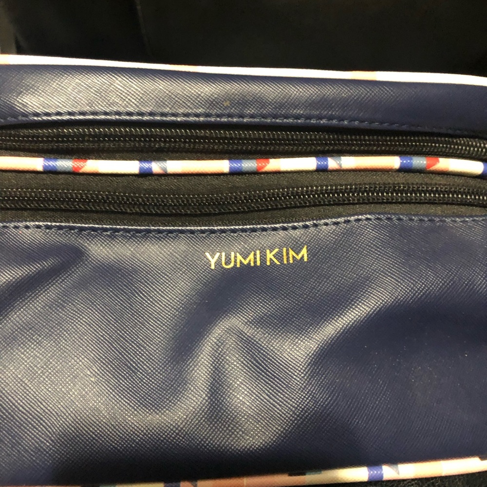 Yumi Kim zipper makeup case and stress relief gel.